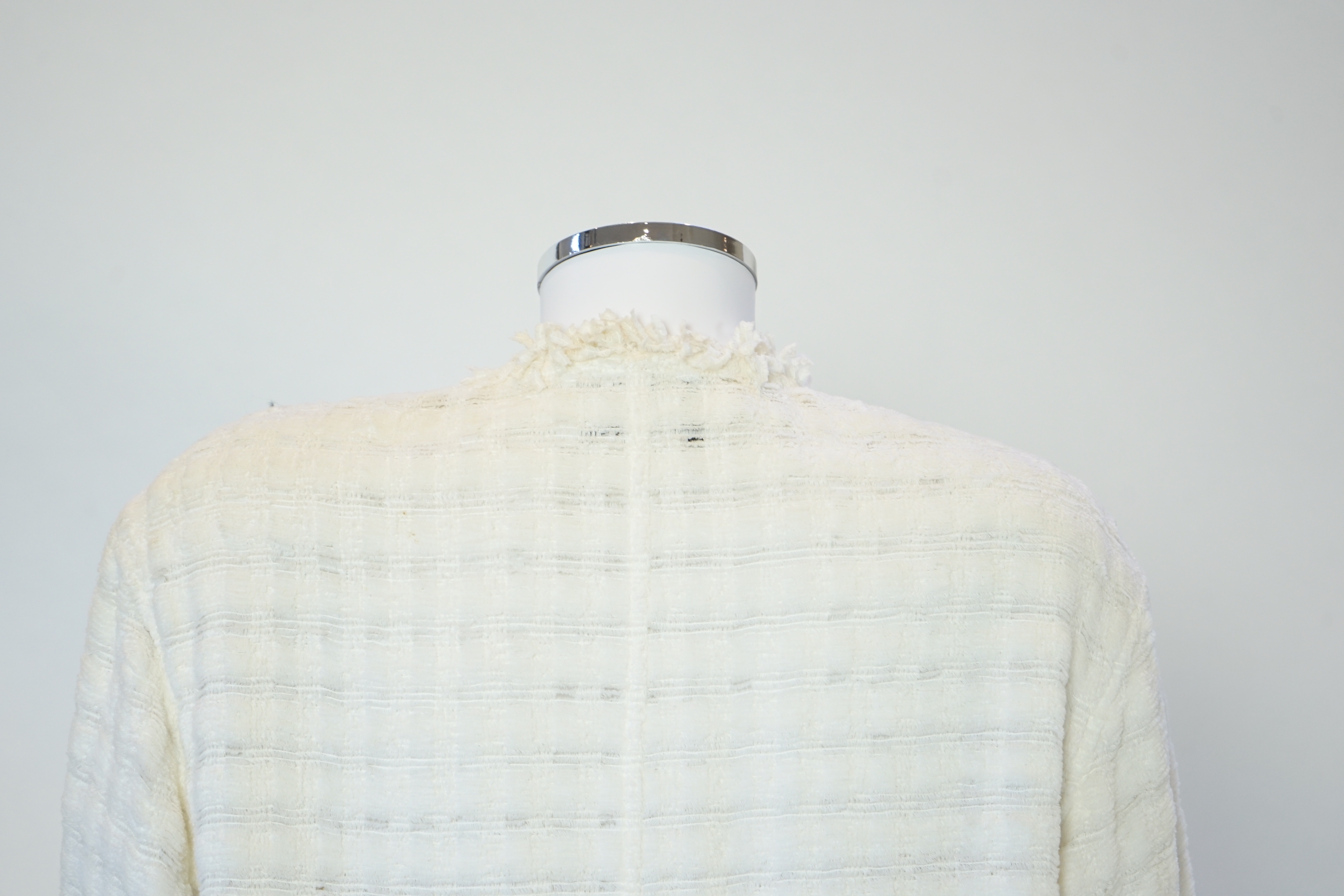 A Chanel early 1990's cream boutique jacket, size 40